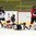 PREROV, CZECH REPUBLIC - JANUARY 11: Switzerland's Lisa Ruedi #11 scores a third period goal against Japan's Ayu Tonosaki #1 while battling Miyuri Ogawa #11 during relegation round action at the 2017 IIHF Ice Hockey U18 Women's World Championship. (Photo by Steve Kingsman/HHOF-IIHF Images)

